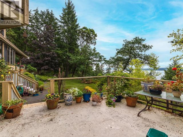 2565 Islands View Dr, House detached with 5 bedrooms, 3 bathrooms and 6 parking in Nanaimo B BC | Image 35