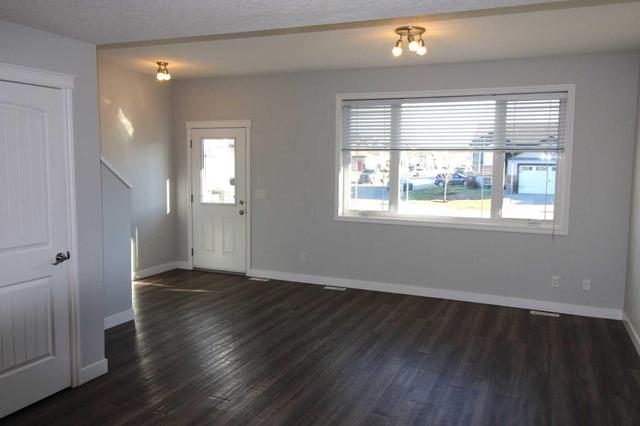 12654 103b Street, Home with 3 bedrooms, 2 bathrooms and 2 parking in Grande Prairie AB | Image 3