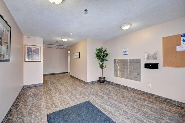 201 - 345 Fisher Mills Rd, Condo with 2 bedrooms, 2 bathrooms and 1 parking in Cambridge ON | Image 33