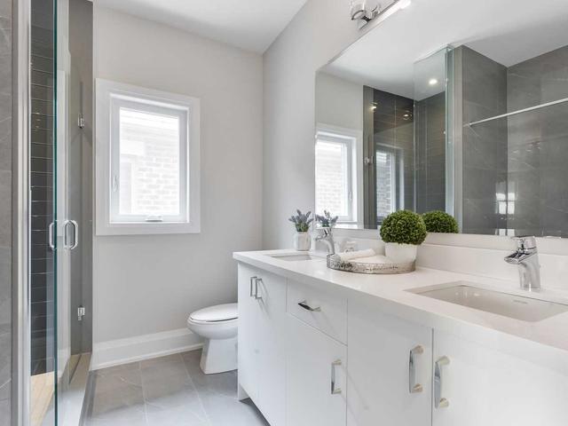 22 Carhartt Ave, House semidetached with 4 bedrooms, 4 bathrooms and 3 parking in Toronto ON | Image 10