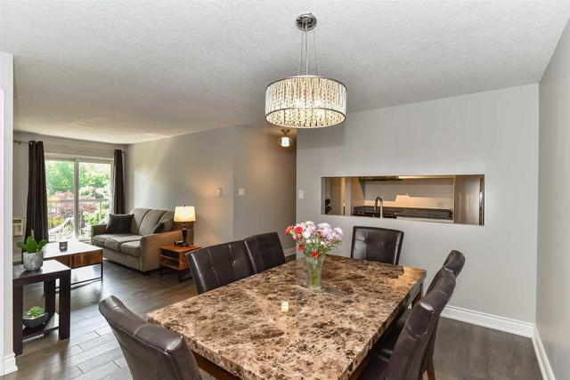 724 - 1450 Glen Abbey Gate, Condo with 3 bedrooms, 2 bathrooms and 1 parking in Oakville ON | Image 3