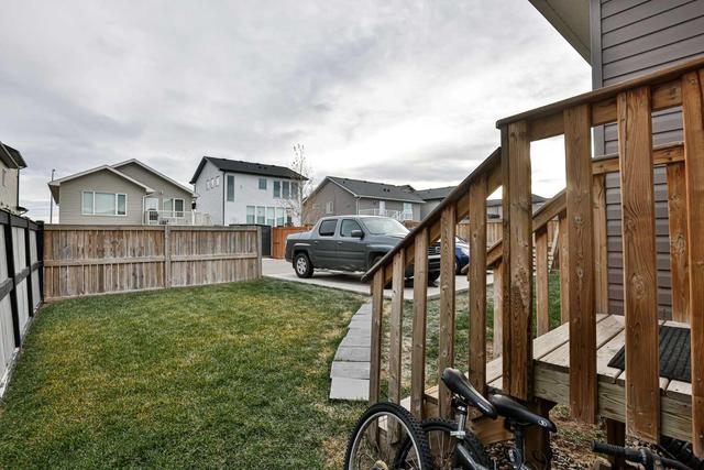 632 Aquitania Boulevard W, House detached with 5 bedrooms, 4 bathrooms and 3 parking in Lethbridge AB | Image 4