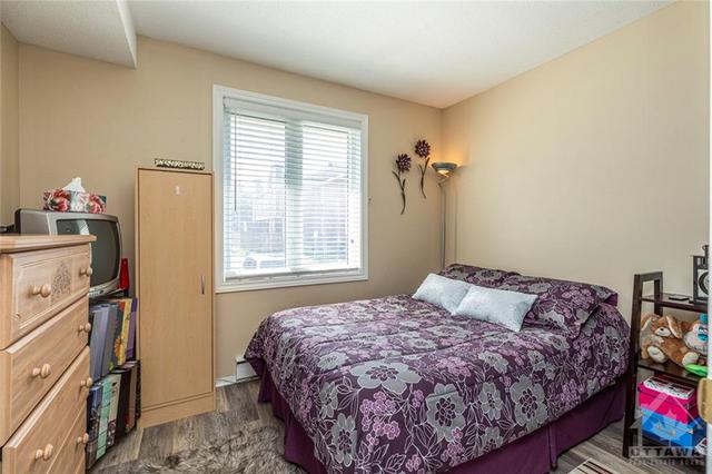 100 - 1725 Marsala Crescent, House attached with 2 bedrooms, 1 bathrooms and 2 parking in Ottawa ON | Image 17