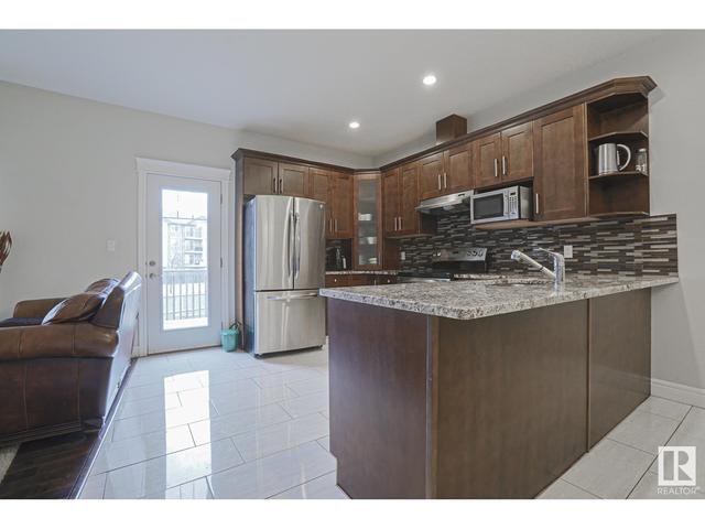 13028 166 Av Nw Nw, House semidetached with 4 bedrooms, 3 bathrooms and null parking in Edmonton AB | Image 7