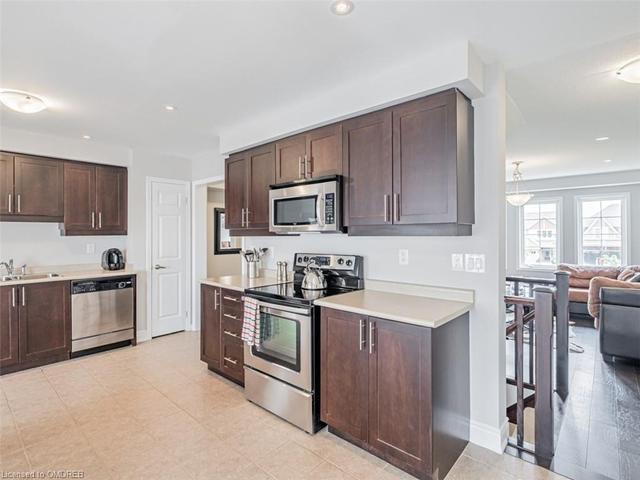 130 Onley Lane, House attached with 3 bedrooms, 2 bathrooms and 3 parking in Milton ON | Image 9