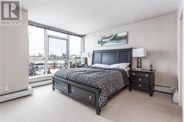 132, - 99 Spruce Place Sw, House attached with 2 bedrooms, 2 bathrooms and 2 parking in Calgary AB | Image 15