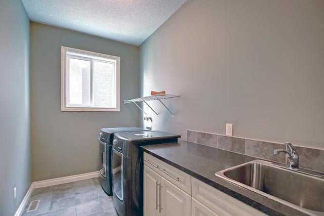 64 Elmont Rise Sw, House detached with 4 bedrooms, 3 bathrooms and 4 parking in Calgary AB | Image 37