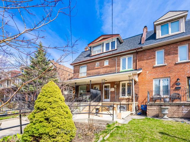 231 Beatrice St, House attached with 4 bedrooms, 2 bathrooms and 1 parking in Toronto ON | Image 1
