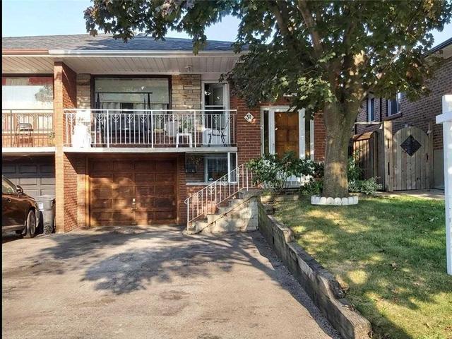 31 Franel Cres, House semidetached with 3 bedrooms, 2 bathrooms and 5 parking in Toronto ON | Image 1
