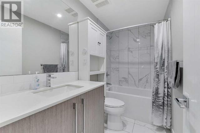 205, - 383 Smith Street Nw, Condo with 2 bedrooms, 2 bathrooms and 1 parking in Calgary AB | Image 19