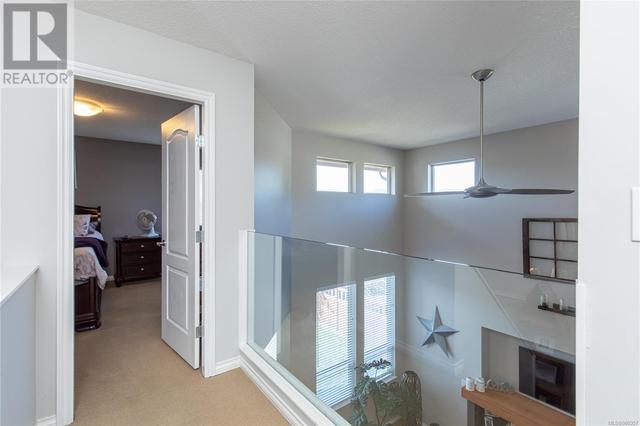 Upstairs looking down to living dining room | Image 18
