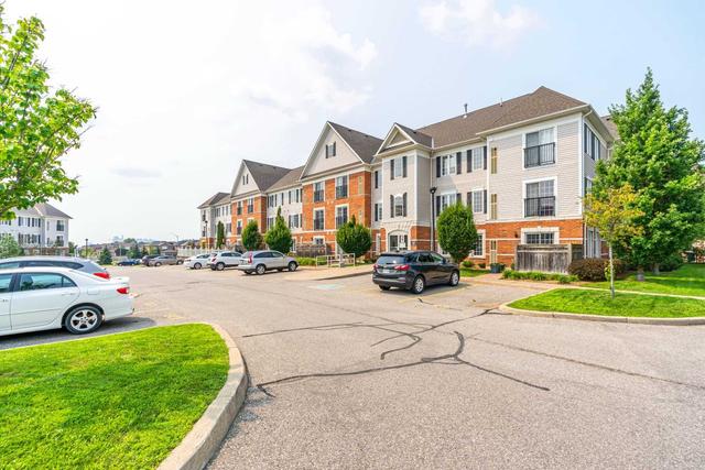98 Aspen Springs Dr, Condo with 1 bedrooms, 1 bathrooms and 2 parking in Clarington ON | Image 9