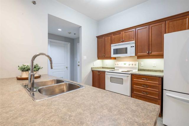 211 - 391 Plains Rd E, Condo with 2 bedrooms, 2 bathrooms and 2 parking in Burlington ON | Image 6