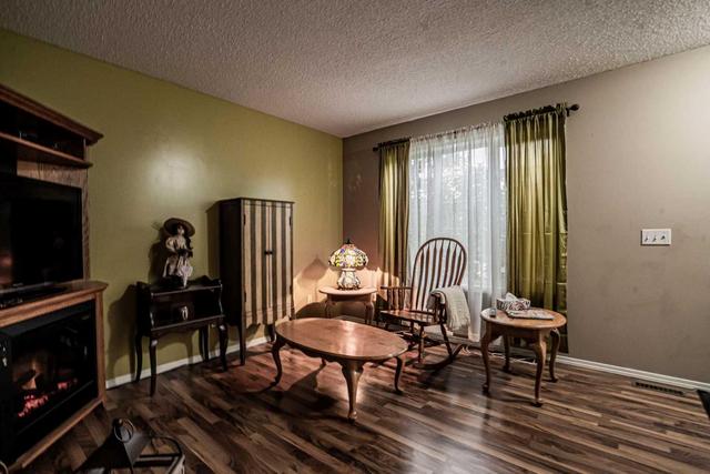 9011 64 Avenue, Home with 4 bedrooms, 2 bathrooms and 2 parking in Grande Prairie AB | Image 10