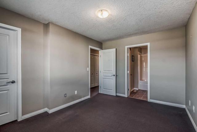 10 Everridge Gardens Sw, Home with 2 bedrooms, 2 bathrooms and 2 parking in Calgary AB | Image 28