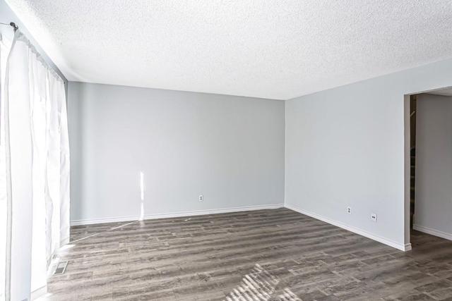 502 - 340 Falconridge Crescent Ne, Home with 3 bedrooms, 1 bathrooms and 1 parking in Calgary AB | Image 7