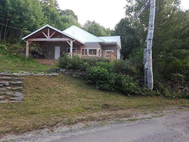 1030 Mcdonald Rd, House detached with 2 bedrooms, 2 bathrooms and 8 parking in Muskoka Lakes ON | Image 1