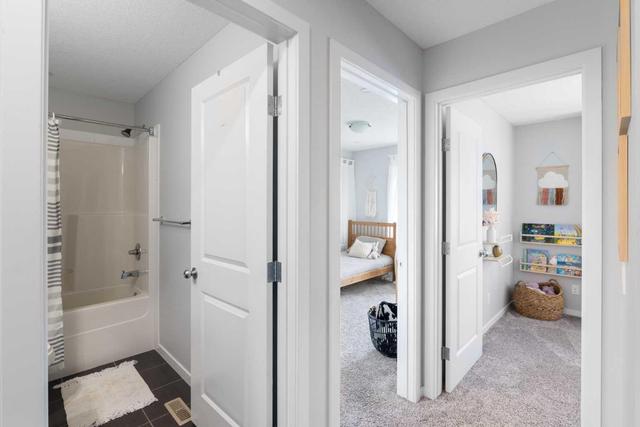 707 Evanston Drive Nw, Home with 3 bedrooms, 2 bathrooms and 2 parking in Calgary AB | Image 8