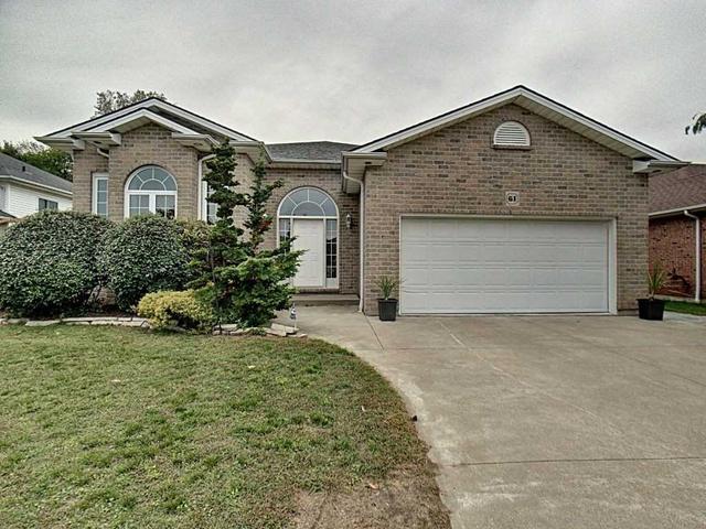 61 Sandy Lake Dr, House detached with 3 bedrooms, 3 bathrooms and 6 parking in Leamington ON | Image 1