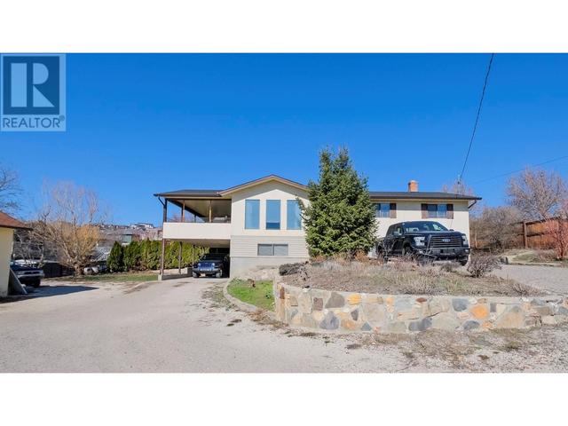 1584 Highway 33 E, House detached with 4 bedrooms, 2 bathrooms and 20 parking in Kelowna BC | Image 43