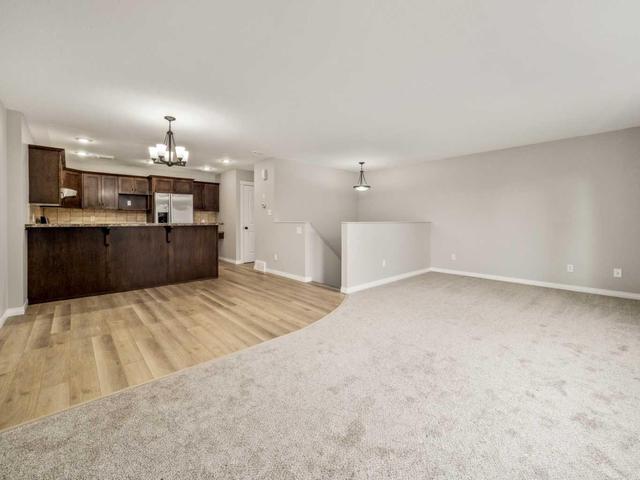 2 - 24 Cougar Cove N, Home with 3 bedrooms, 1 bathrooms and 1 parking in Lethbridge AB | Image 10