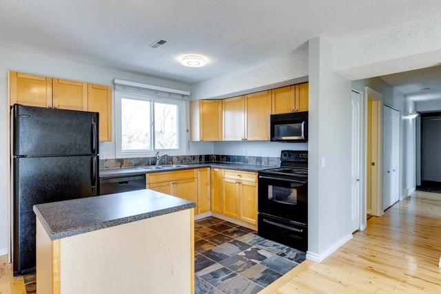 112 - 1540 29 Street Nw, Condo with 2 bedrooms, 1 bathrooms and 1 parking in Calgary AB | Image 3