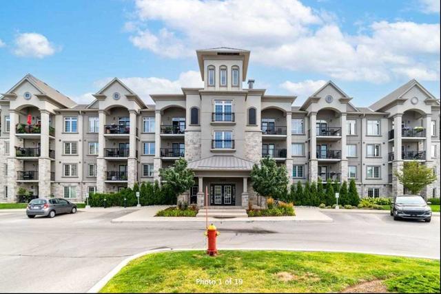 114 - 1470 Main St E, Condo with 2 bedrooms, 2 bathrooms and 1 parking in Milton ON | Image 1