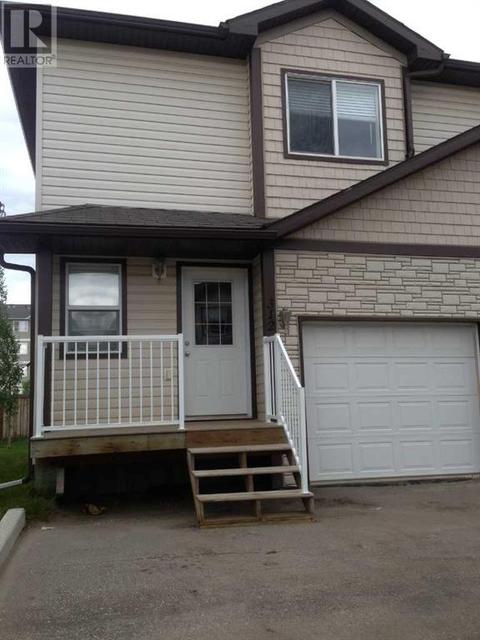 312, - 10150 121 Avenue, House attached with 3 bedrooms, 1 bathrooms and 3 parking in Grande Prairie AB | Card Image