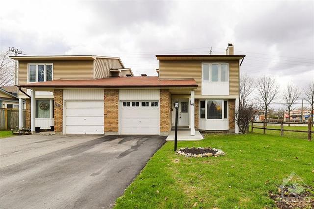 66 Knollsbrook Drive, Home with 3 bedrooms, 2 bathrooms and 3 parking in Ottawa ON | Image 1