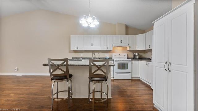 11 - 35 Cobden Court, House attached with 3 bedrooms, 2 bathrooms and 2 parking in Brantford ON | Image 30