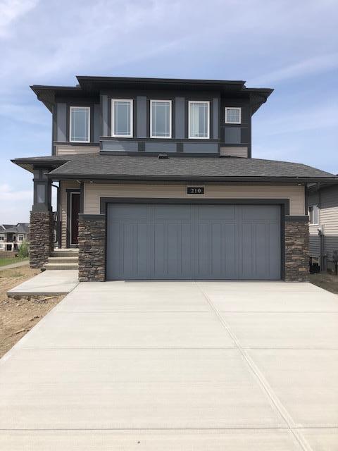 210 Knight Avenue, House detached with 4 bedrooms, 2 bathrooms and 4 parking in Crossfield AB | Image 1