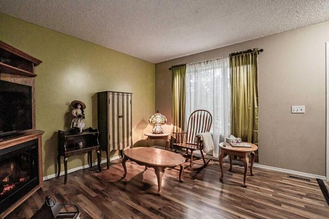 9011 64 Avenue, Home with 4 bedrooms, 2 bathrooms and 2 parking in Grande Prairie AB | Image 9