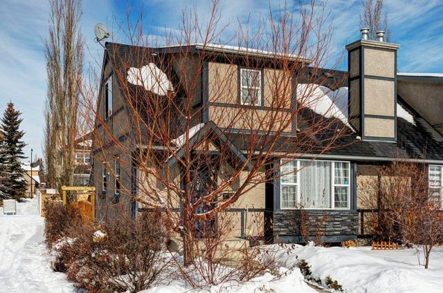 38 Quentin Place Sw, Home with 3 bedrooms, 2 bathrooms and 2 parking in Calgary AB | Image 9