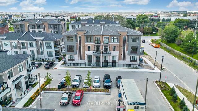 313 - 10 Halliford Pl, Townhouse with 2 bedrooms, 2 bathrooms and 1 parking in Brampton ON | Image 1