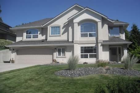 1696 Spruceglen Dr, House detached with 3 bedrooms, 3 bathrooms and 4 parking in Kelowna BC | Card Image