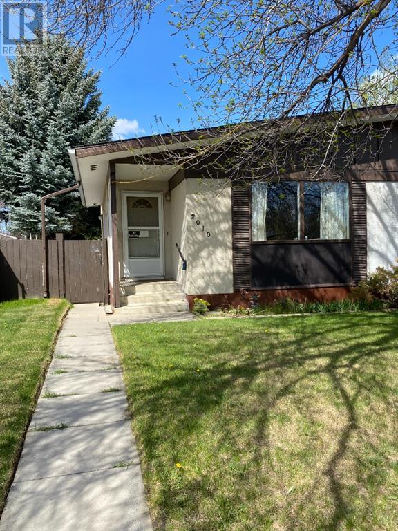 2010 23 Street N, Home with 4 bedrooms, 1 bathrooms and 3 parking in Lethbridge AB | Card Image