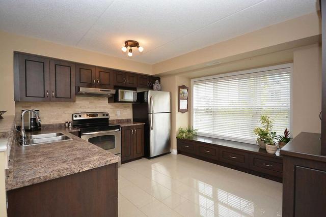 211 - 1380 Main St E, Condo with 3 bedrooms, 2 bathrooms and 2 parking in Milton ON | Image 8