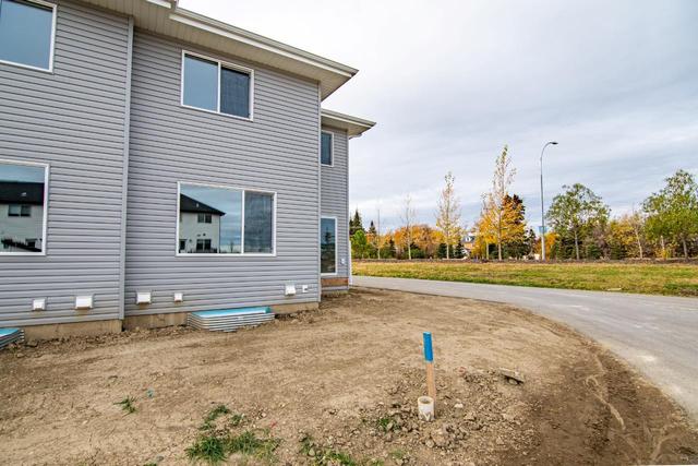 50 Earl Close, Home with 3 bedrooms, 2 bathrooms and 4 parking in Red Deer County AB | Image 33