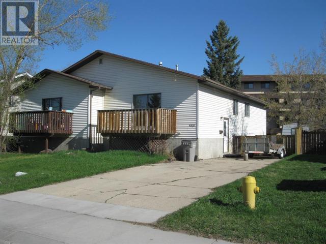 9320 - 74 None Avenue, Home with 4 bedrooms, 2 bathrooms and 2 parking in Grande Prairie AB | Card Image