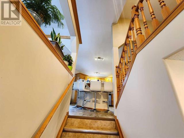 Stairs leading to the kitchen / Living room | Image 2