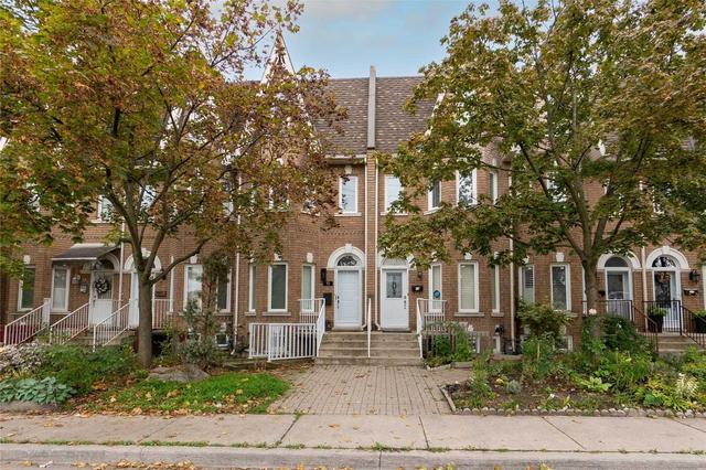 13 Lippincott St E, House attached with 5 bedrooms, 4 bathrooms and 1 parking in Toronto ON | Image 1