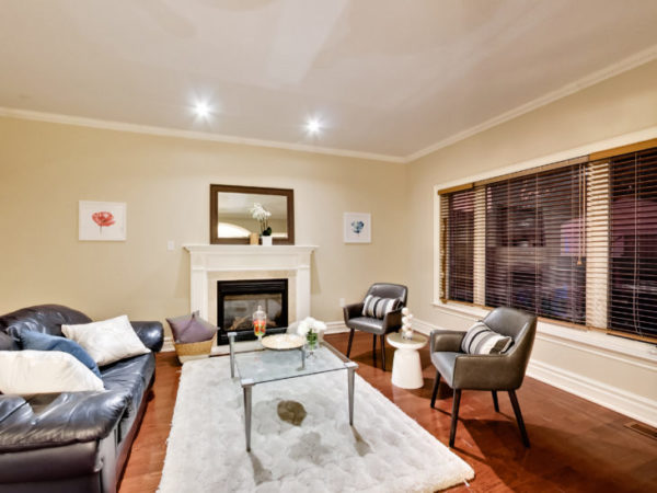 Keep cosy with the living room fireplace, and generous natural light.