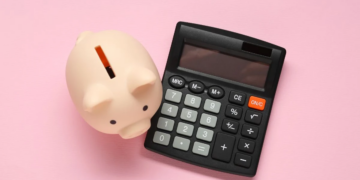piggy bank and calculator