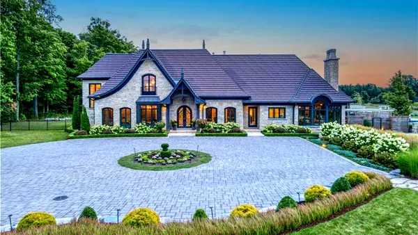Living Lavish in Toronto Luxury Listings, image of 6547 Wellington County Road 34 viewing the circular driveway and home.