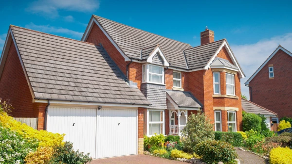 A detached house on a sunny day.