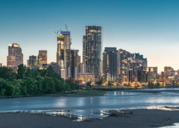 The Calgary skyline while the sun is setting.