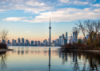 A photo of the Toronto skyline from across a body of water.