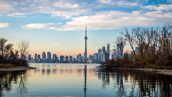 A photo of the Toronto skyline from across a body of water.