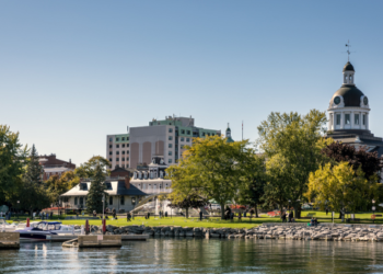 A riverbank in a small town.