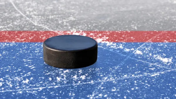 Close up of a hockey puck on ice